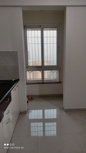 Kitchen in 1 BHK Apartment at Unnati Woods CHS, Kasarvadavali – for Rent