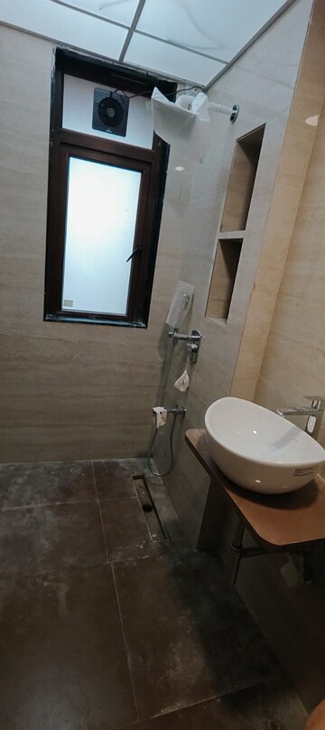 Bathroom in 3 BHK Apartment at Surbhi CHS Andheri West, Andheri West – for Rent