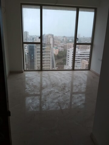 Room in 2 BHK Apartment at Transcon Triumph Tower, Andheri West – for Rent