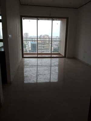 Room in 2 BHK Apartment at Transcon Triumph Tower, Andheri West – for Rent