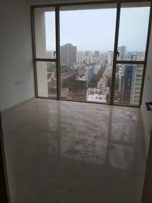 Room in 2 BHK Apartment at Transcon Triumph Tower, Andheri West – for Rent