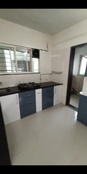 Kitchen in 3 BHK Apartment at Venkatesh Lake Vista, Katraj – for Rent