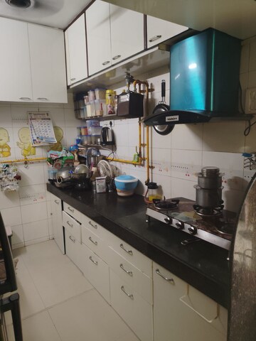 Kitchen in 2 BHK Apartment at Suvidha Regal Heights, Vasai East – for Rent