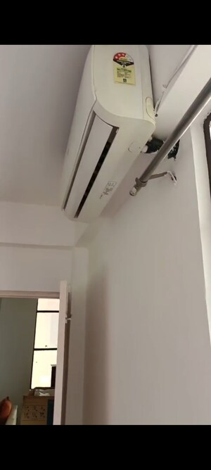 Building Lobby in 2 BHK Apartment at AHIP Signature, Sector 18 – for Rent