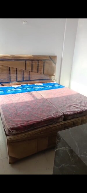 Bedroom in 2 BHK Apartment at AHIP Signature, Sector 18 – for Rent