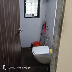 Bathroom in 3 BHK Apartment at Kanakia Space Samarpan Exotica, Magathane – for Rent