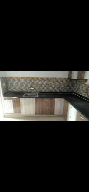 Kitchen in 4 BHK Apartment at Shri Radha Sky Gardens, Sector 16b Greater Noida – for Rent