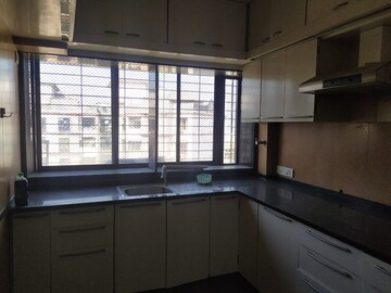 Kitchen in 2 BHK Apartment at New Mhada Towers, Andheri West – for Rent