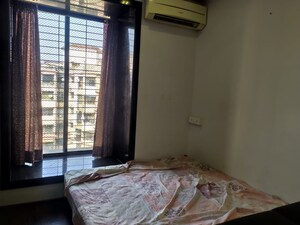 Bedroom in 2 BHK Apartment at New Mhada Towers, Andheri West – for Rent