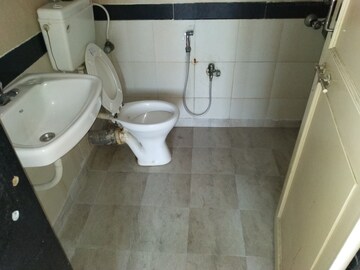 Bathroom in 2 BHK Apartment at New Mhada Towers, Andheri West – for Rent