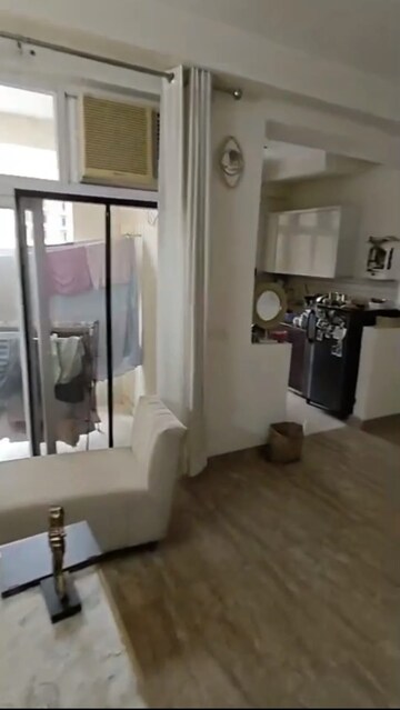 Living Room in 2 BHK Apartment at Amrapali Silicon City, Sector 76 – for Sale