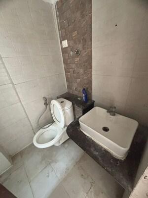 Bathroom in 2.5 BHK Apartment at Arihant Amber, Sector 1 Greater Noida – for Sale