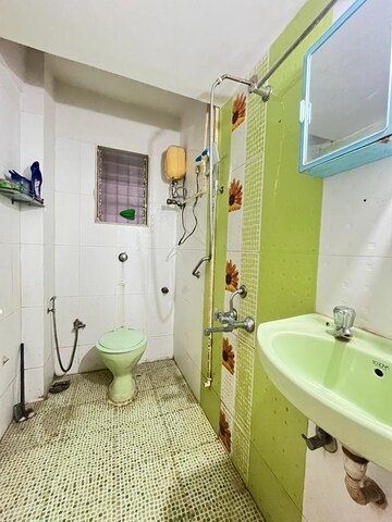 Bathroom in 1 BHK Apartment at Lalani Residency, Kavesar – for Rent