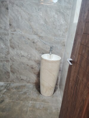 Bathroom in 3 BHK Builder Floor at AAR AAR Homes, Green Fields Colony – for Sale