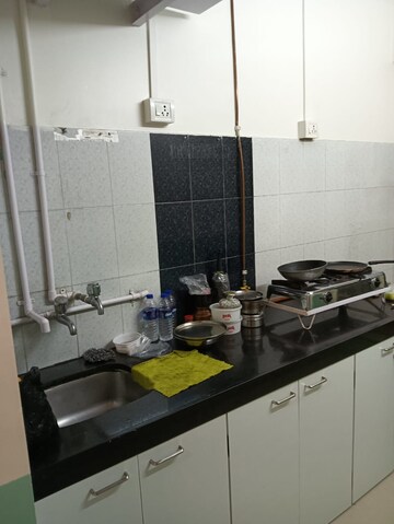 Kitchen in 1 BHK Apartment at Bhageshwar Bhuvan, Mahim – for Sale