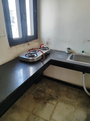 Kitchen in 1 RK Villa at RWA Apartments Sector 19, Sector 19 – for Rent