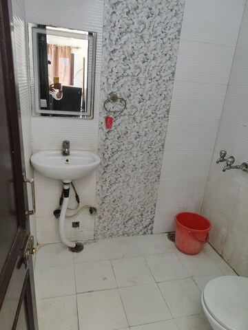 Bathroom in 1 RK Villa at RWA Apartments Sector 19, Sector 19 – for Rent
