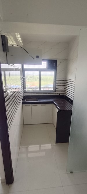 Kitchen in 1 BHK Apartment at JVM Aroma, Kasarvadavali – for Rent