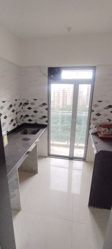 Kitchen in 1 BHK Apartment at JVM Veda, Kasarvadavali – for Rent