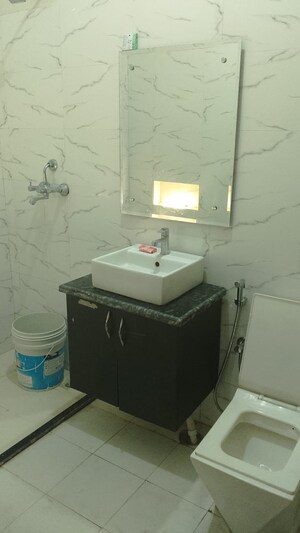 Attached Bathroom in 1.5 BHK Builder Floor at Sector 57 – for Rent