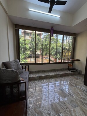 Room in 2 BHK Apartment at Khar West – for Rent