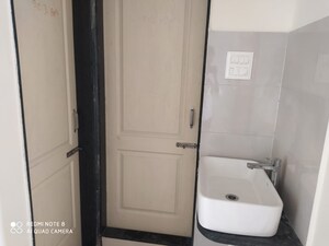 Bathroom in 1 BHK Apartment at LS Laxmi Avenue, Wakad – for Rent