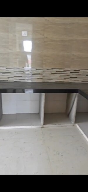 Kitchen in 3 BHK Apartment at Raj Infinia, Malad West – for Rent