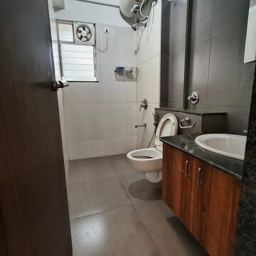 Bathroom in 3 BHK Apartment at Gera Song Of Joy, Kharadi – for Rent