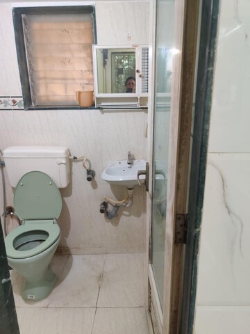 Bathroom in 2 BHK Apartment at Yashraj Park CHS, Kasarvadavali – for Rent