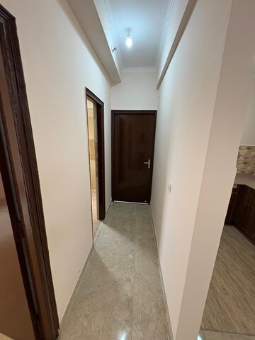 Building Lobby in 2 BHK Apartment at Amrapali Golf Homes, Sector 4 Greater Noida – for Sale