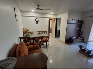 Living Room in 2 BHK Apartment at Cosmos Classique, Ghodbunder Road – for Sale