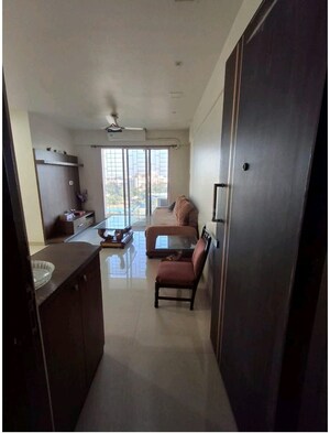 Living Room in 2 BHK Apartment at Cosmos Classique, Ghodbunder Road – for Sale