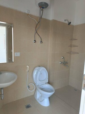 Bathroom in 3 BHK Apartment at Emaar Palm Gardens, Sector 83 – for Sale