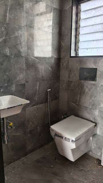 Bathroom in 2 BHK Apartment at Pratham ARC Aura, Andheri West – for Rent