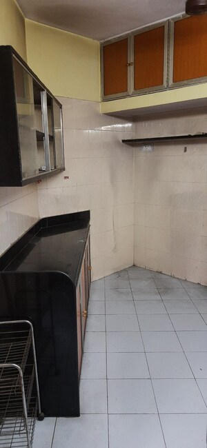 Kitchen in 1 BHK Apartment at Vijay Nagri CHS Ltd Building No 11, Waghbil – for Rent