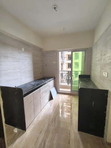 Kitchen in 2 BHK Apartment at Siddhi Highland Springs, Dhokali – for Sale