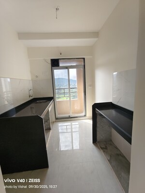 Kitchen in 1 BHK Apartment at DSS Mahavir Kalpavruksha Alcacia Tower, Ghodbunder Road – for Rent