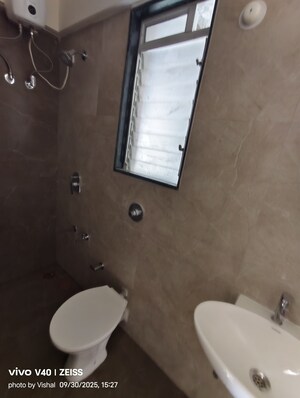 Bathroom in 1 BHK Apartment at DSS Mahavir Kalpavruksha Alcacia Tower, Ghodbunder Road – for Rent