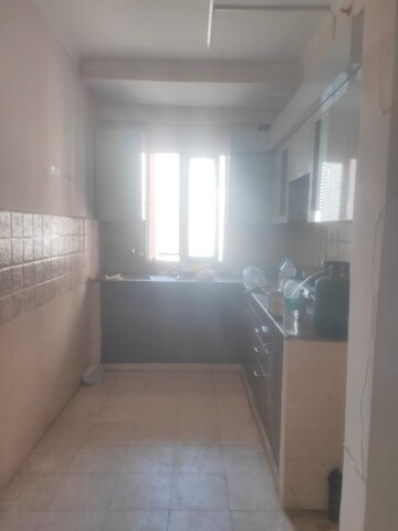 Kitchen in 3 BHK Apartment at Mahagun Mezzaria, Sector 78 – for Rent