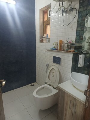 Bathroom in 3 BHK Builder Floor at Ansal Plaza Sector-23, Sector 23 – for Rent