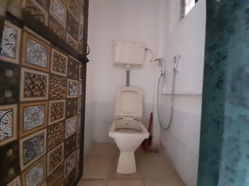 Bathroom in 1 BHK Apartment at Bimbisar Nagar, Goregaon East – for Rent