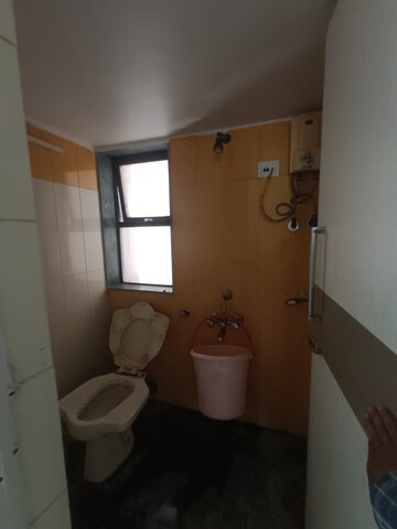 Bathroom in 1 BHK Apartment at Sheth Vasant Galaxy, Goregaon West – for Rent
