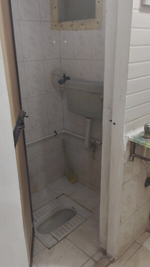 Bathroom in 2 BHK Apartment at Kopar Khairane Sector 19 – for Rent