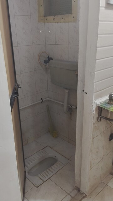 Bathroom in 2 BHK Apartment at Kopar Khairane Sector 19 – for Rent