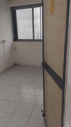 Room in 2 BHK Apartment at Kopar Khairane Sector 19 – for Rent