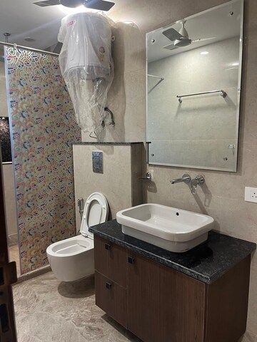 Bathroom in 4 BHK Builder Floor at Greater Kailash – for Rent