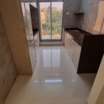 Kitchen in 2 BHK Apartment at Ashapura Galaxy, Ambivali – for Sale