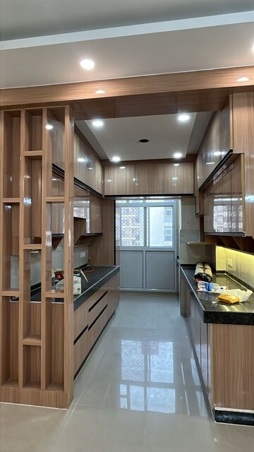Kitchen in 4 BHK Apartment at Mahagun Mezzaria, Sector 78 – for Rent
