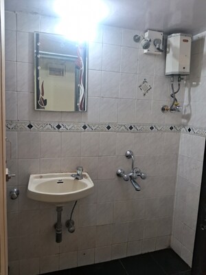 Bathroom in 2 BHK Apartment at Dosti Estates, Wadala East – for Rent