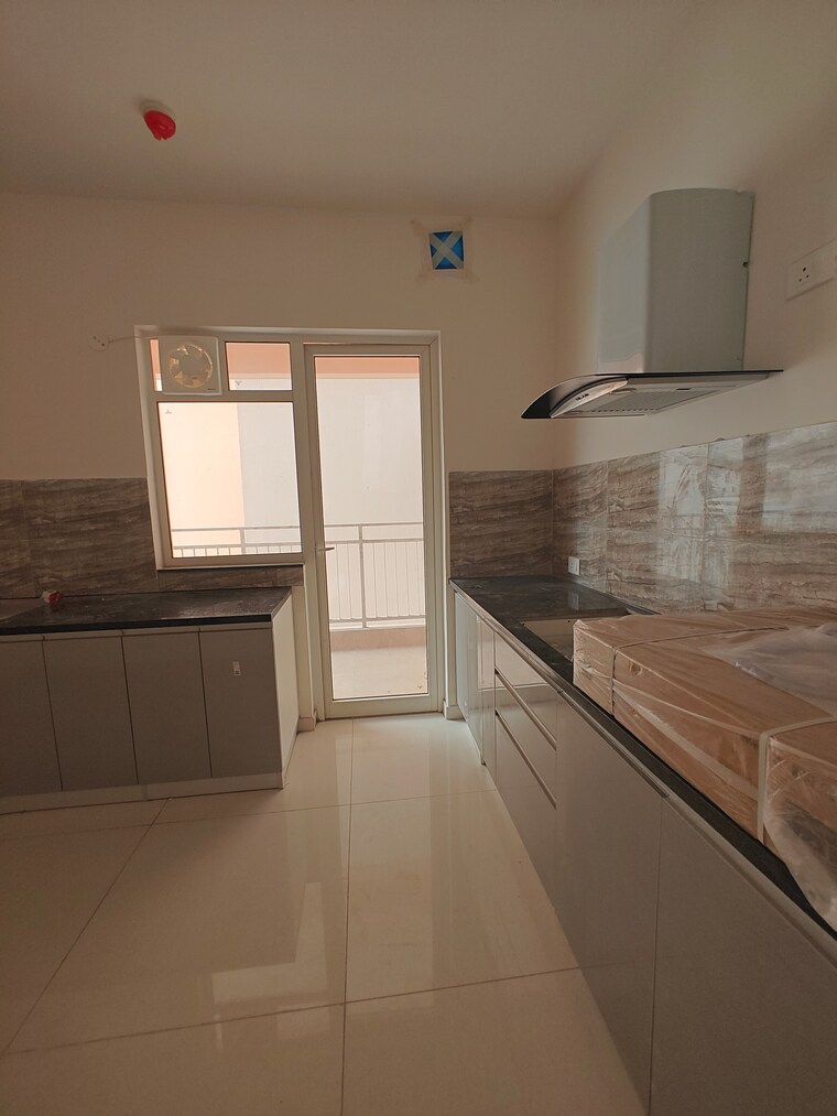 Kitchen, shapoorji-pallonji-joyville-phase-2 3 Bedroom 1692 Sq.Ft. Apartment In Sector 102 Gurgaon 9263856